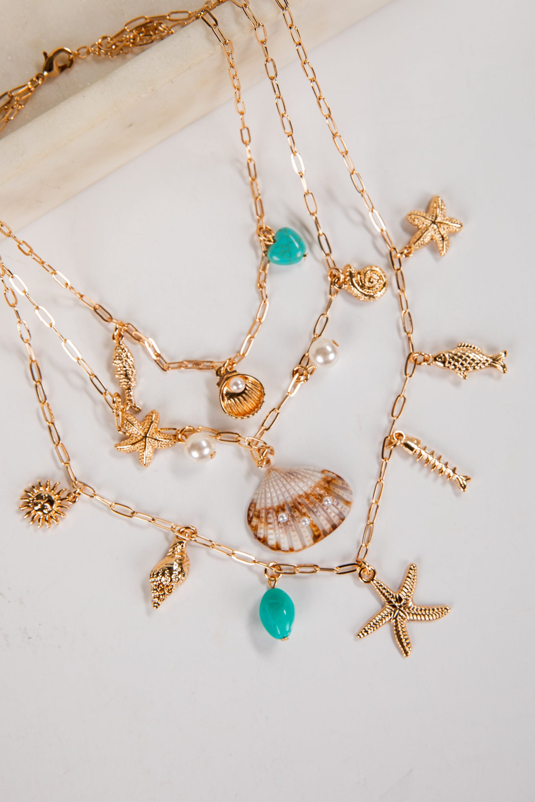 shopdressup_gold_seashell_layered_charm_necklace-3.jpg